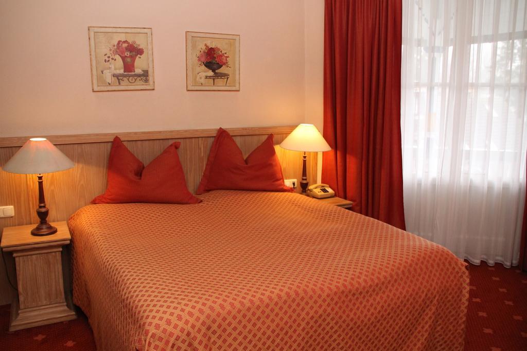 Romantik Im Hotel Villa Roehl Timmendorfer Strand Quarto foto